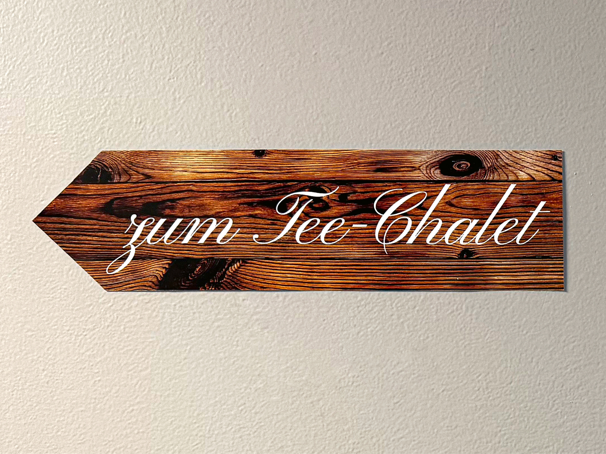 Wegweiser zum Tee-Chalet